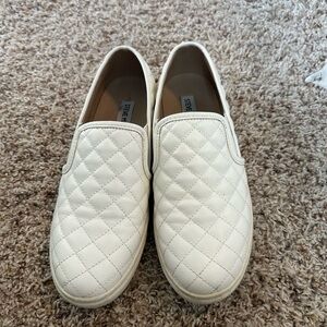 White quilted Steve Madden slip on sneakers